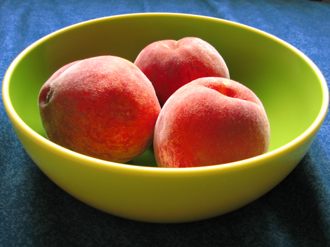 Those peaches have been colour enhanced to make you disappointed if you really see them.